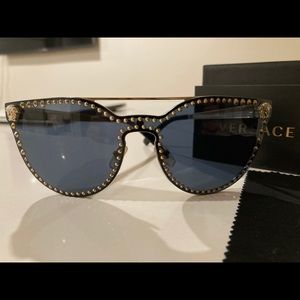 Versace sunglasses with sunglass case and box.